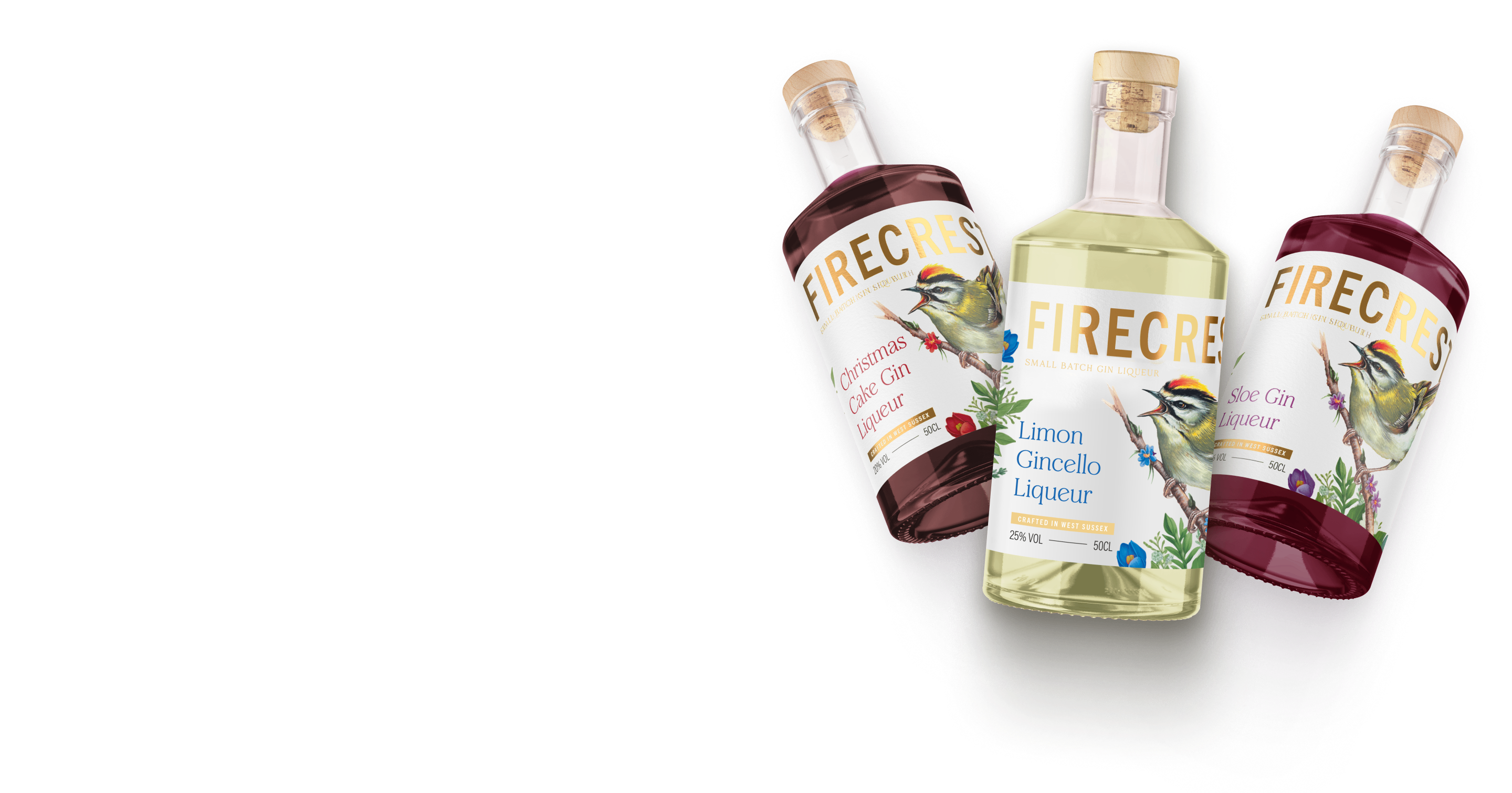 Three bottles of Firecrest liqueur on a white background